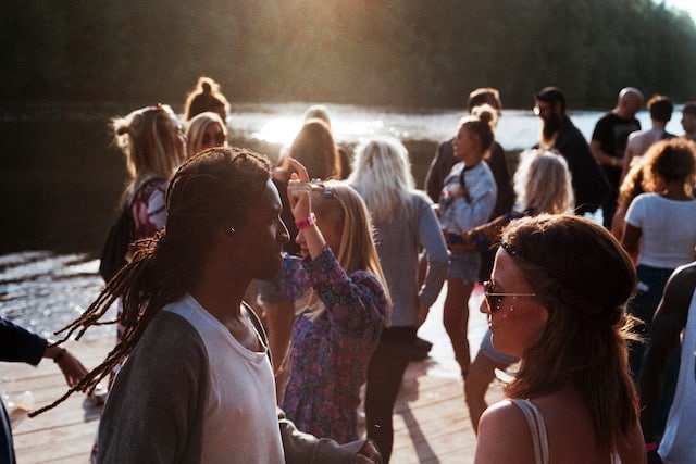 Cottage-goers at a dock party in summer.