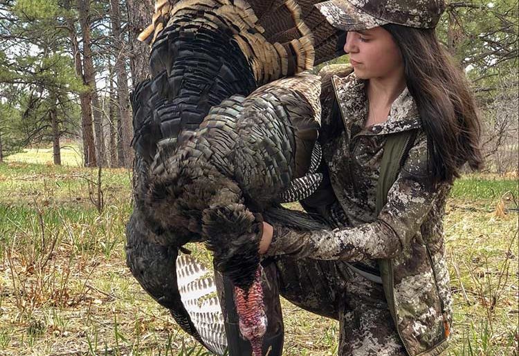 Female-campfire-collective-turkey-hunter-after-successful-hunt