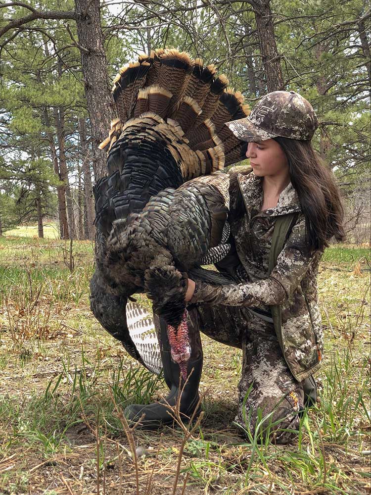 Turkey hunter with tom